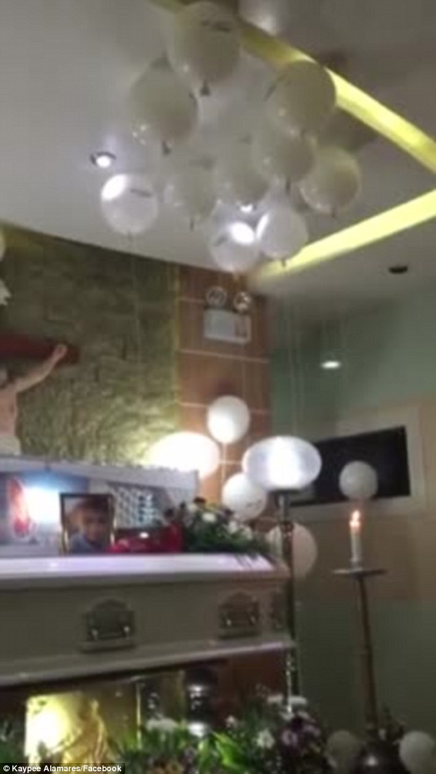 The ghost of a child who consoles his grieving mother at his funeral is